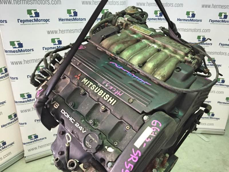 Где находится номер двигателя на митсубиси диамант 6g73
